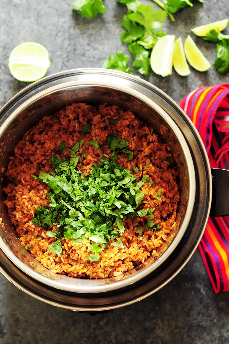 A detailed step-by-step guide on how to make Mexican rice that's authentic, healthy, and addictive every single time. Recipe included.