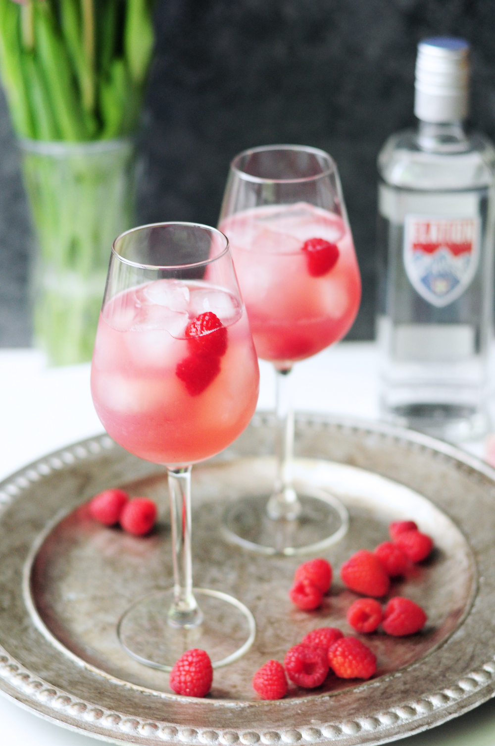 This Meyer lemon raspberry cocktail is the perfect combination of tart and sweet, which makes it an ideal (yet versatile) spring or summer patio drink.