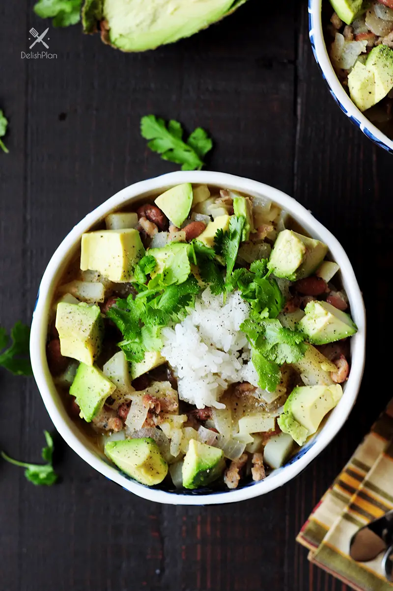 A quick one-pot chili featuring tender pork and a refreshing mojo sauce. This gluten-free pork chili recipe is done in 30 mins from start to finish!