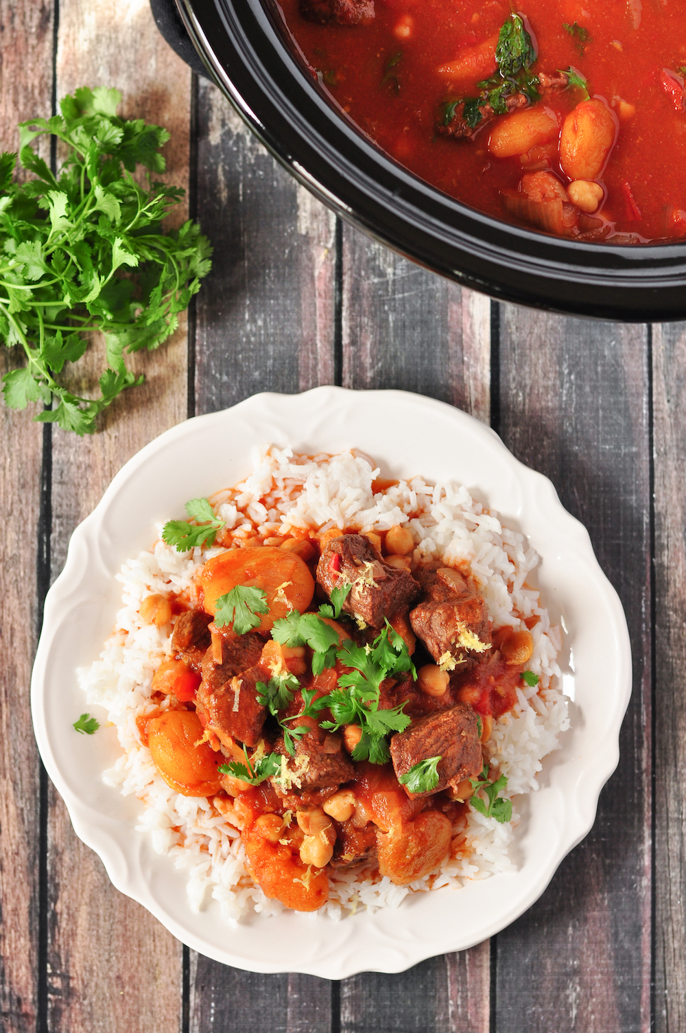 This gluten-free Moroccan lamb stew is made in 5 easy steps, and the slow cooker does the rest. Loaded with authentic spices and flavors. 