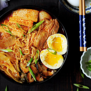 This epic kimchi ramen features pork belly, shiitake mushrooms, bok choy, tofu, and kimchi! The best part is that it's one pot and only takes 30 minutes!