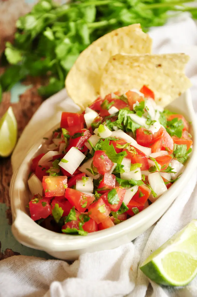 This quick pico de gallo recipe takes just 15 minutes! Fresh, vibrant, and versatile—perfect for tacos, chips, and more. Gluten-free, vegan, and low-carb.