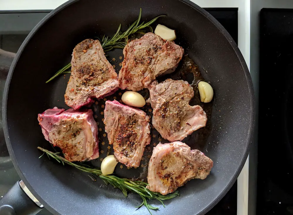 Pre-searing lamb chops with garlic