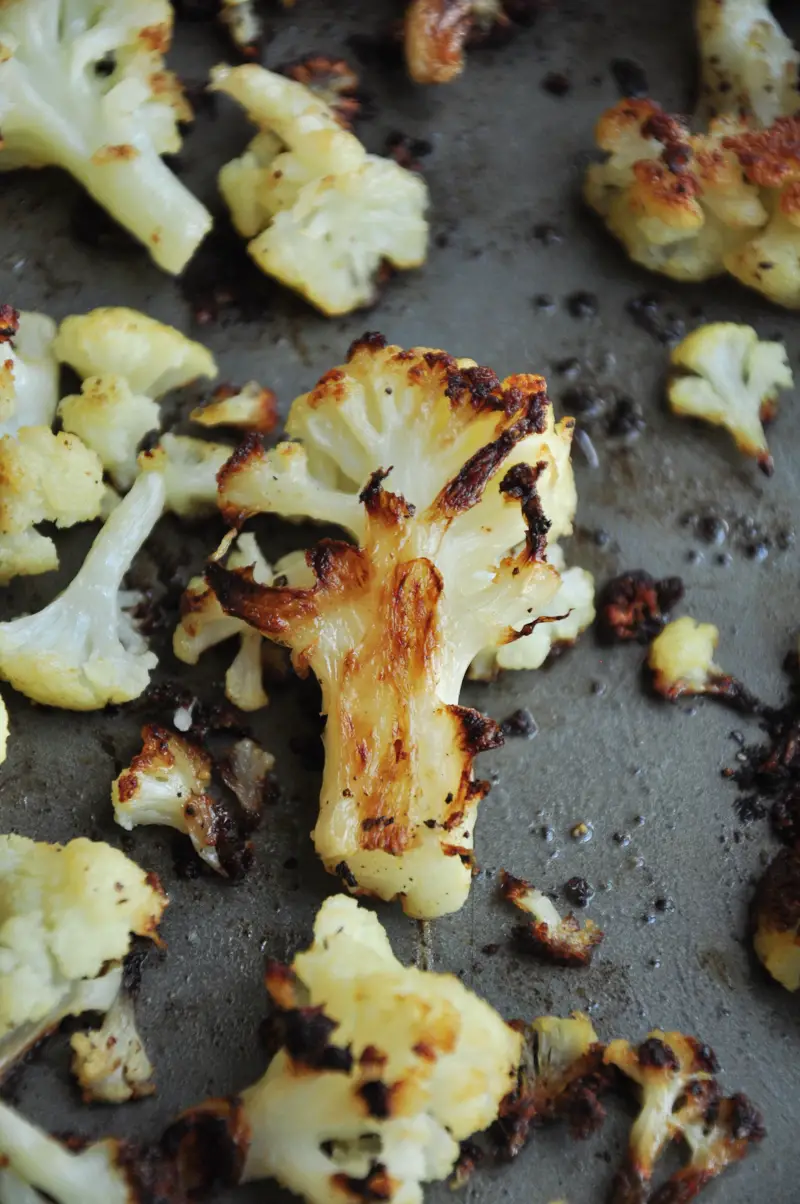 Say goodbye to bland and boring cauliflower. This roasted Asian cauliflower with a soy-ginger sauce is healthy, hearty, and a vegan crowd-pleaser. 