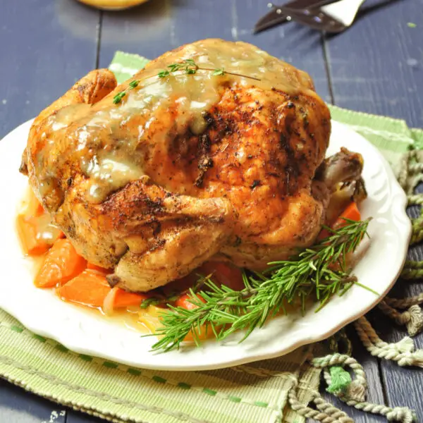 Roasted Lemon Herb Whole Chicken with Carrots and Onions