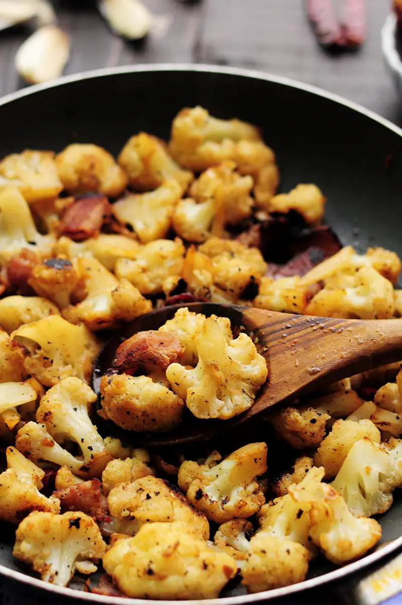 An easy recipe with only 7 ingredients like this sautéed cauliflower with bacon is perfect for any busy workday dinner. It’s a little spicy, gluten-free and so delicious that you won’t want to stop digging in.