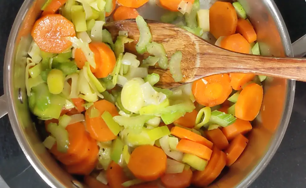 Sautéing vegetables for chicken leek soup