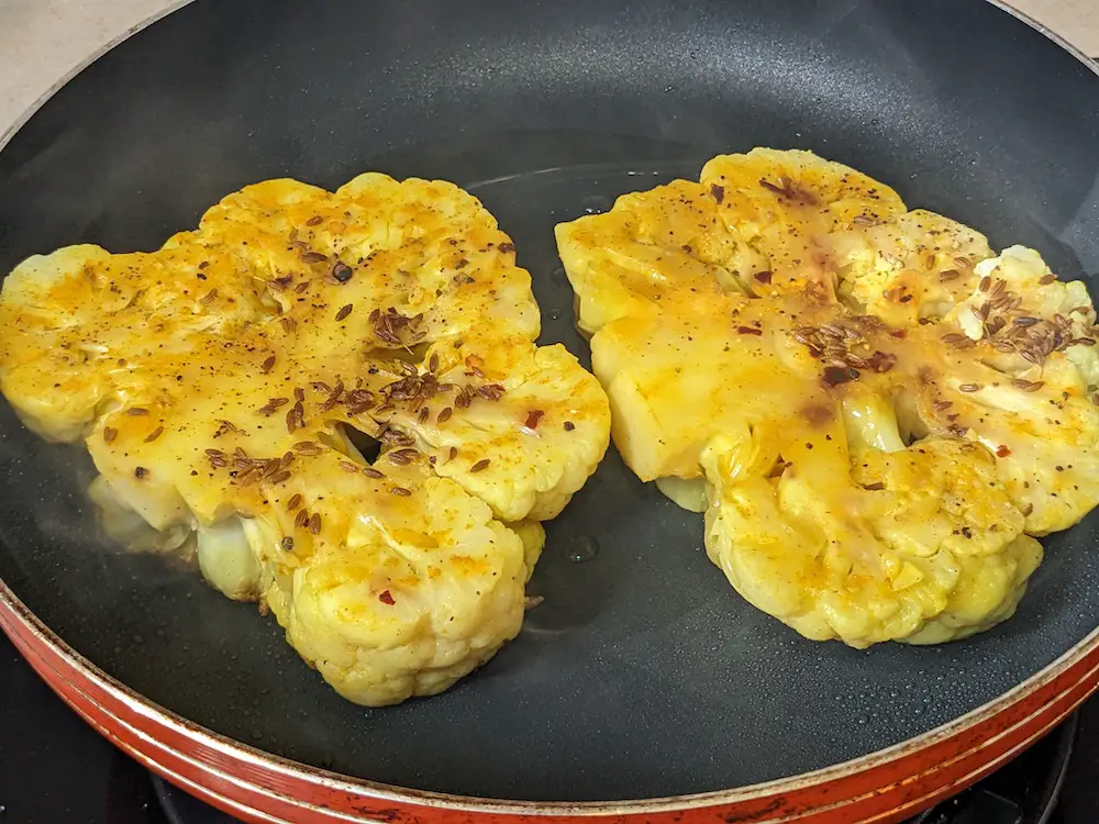 Sear cauliflower steaks