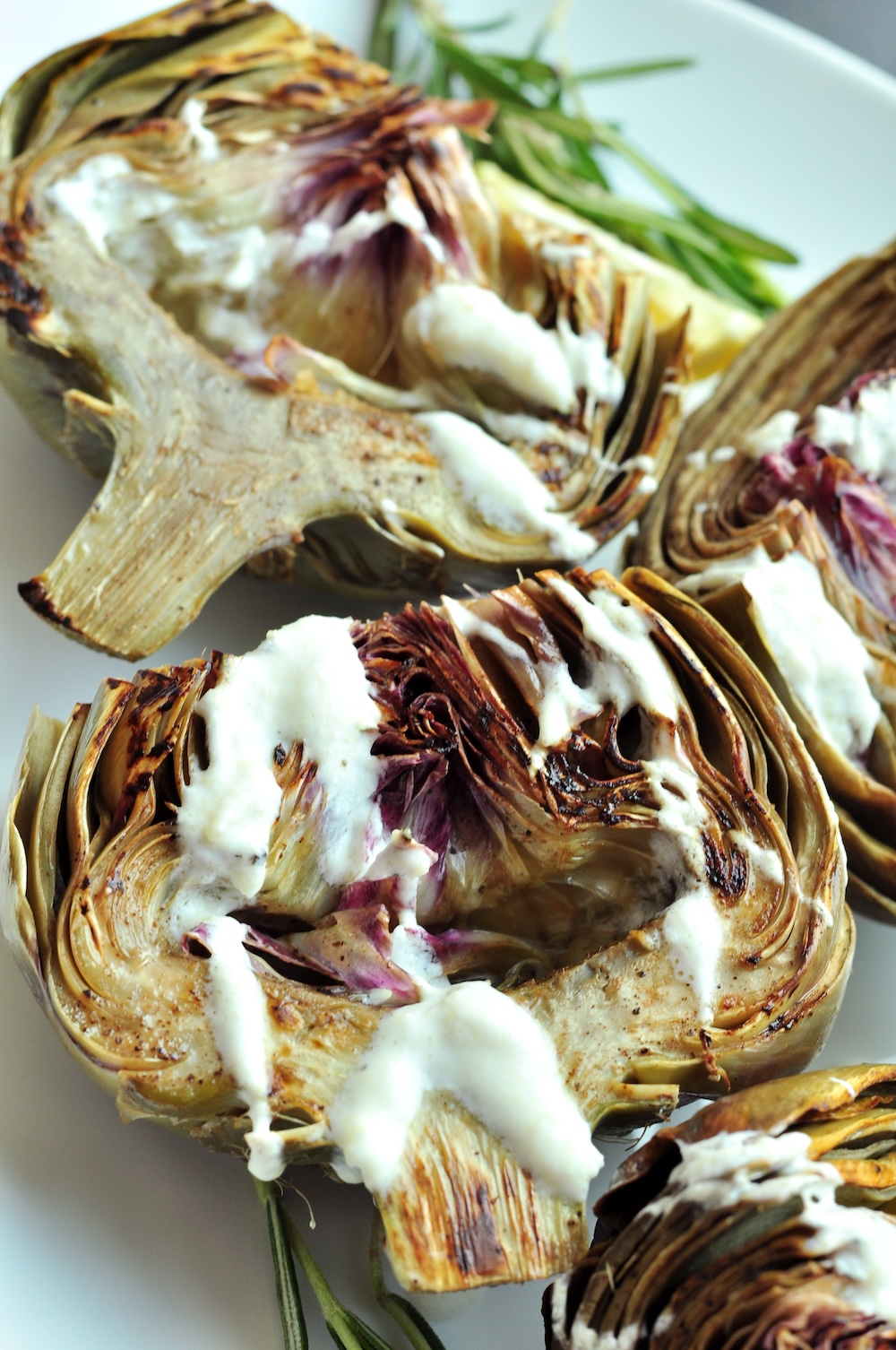 These beautifully tender sous vide artichokes are a versatile choice as either a sophisticated appetizer or a refined side dish for your main courses. Serve them with a homemade yogurt dipping sauce—its creaminess and hint of zest complement the subtle, earthy flavor of the artichokes exquisitely.