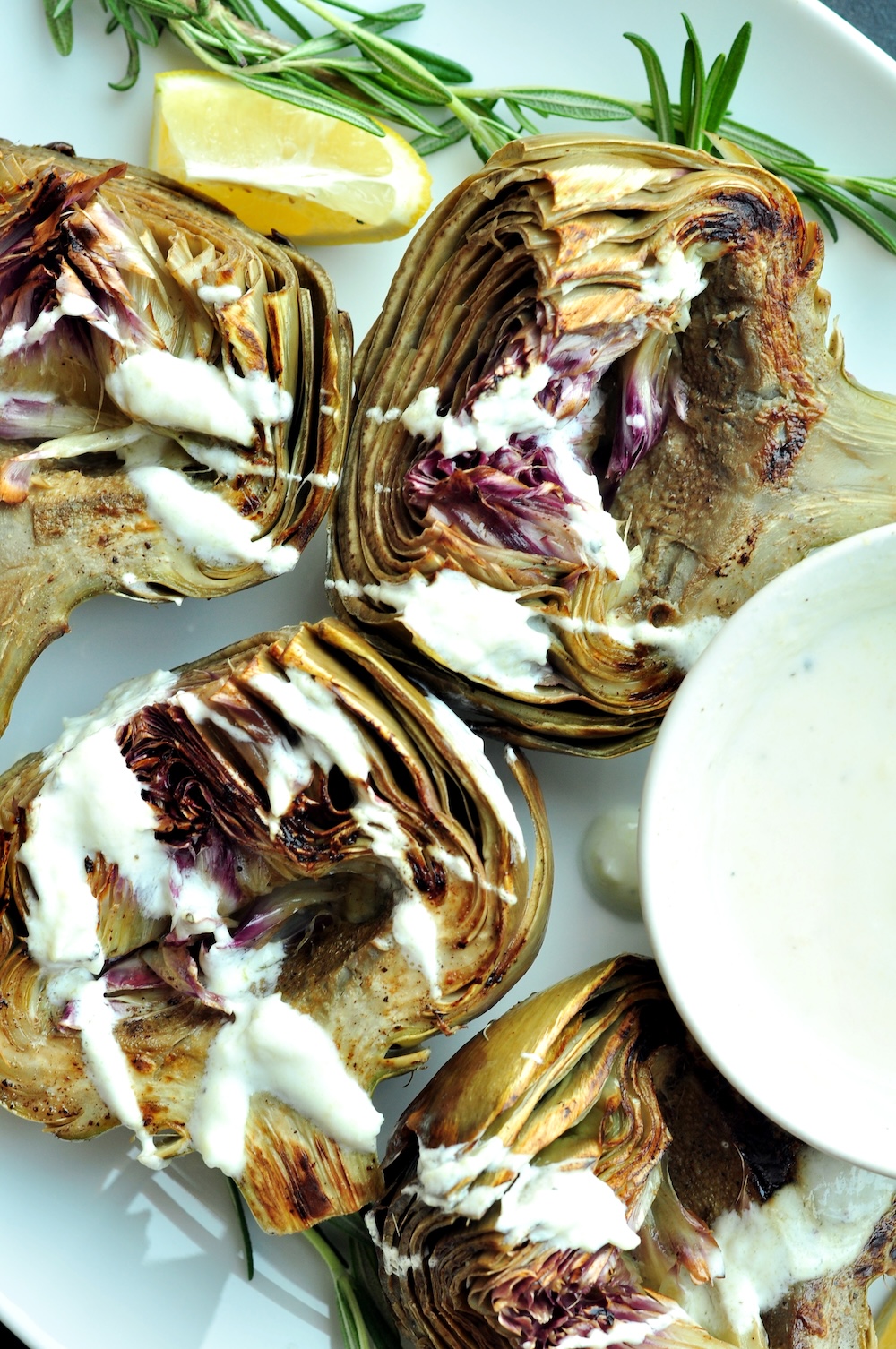 These beautifully tender sous vide artichokes are a versatile choice as either a sophisticated appetizer or a refined side dish for your main courses. Serve them with a homemade yogurt dipping sauce—its creaminess and hint of zest complement the subtle, earthy flavor of the artichokes exquisitely.