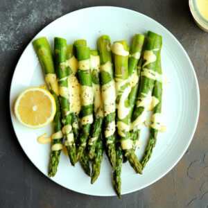 Sous Vide Asparagus drizzled with hollandaise sauce