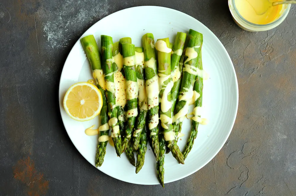 Sous Vide Asparagus drizzled with hollandaise sauce