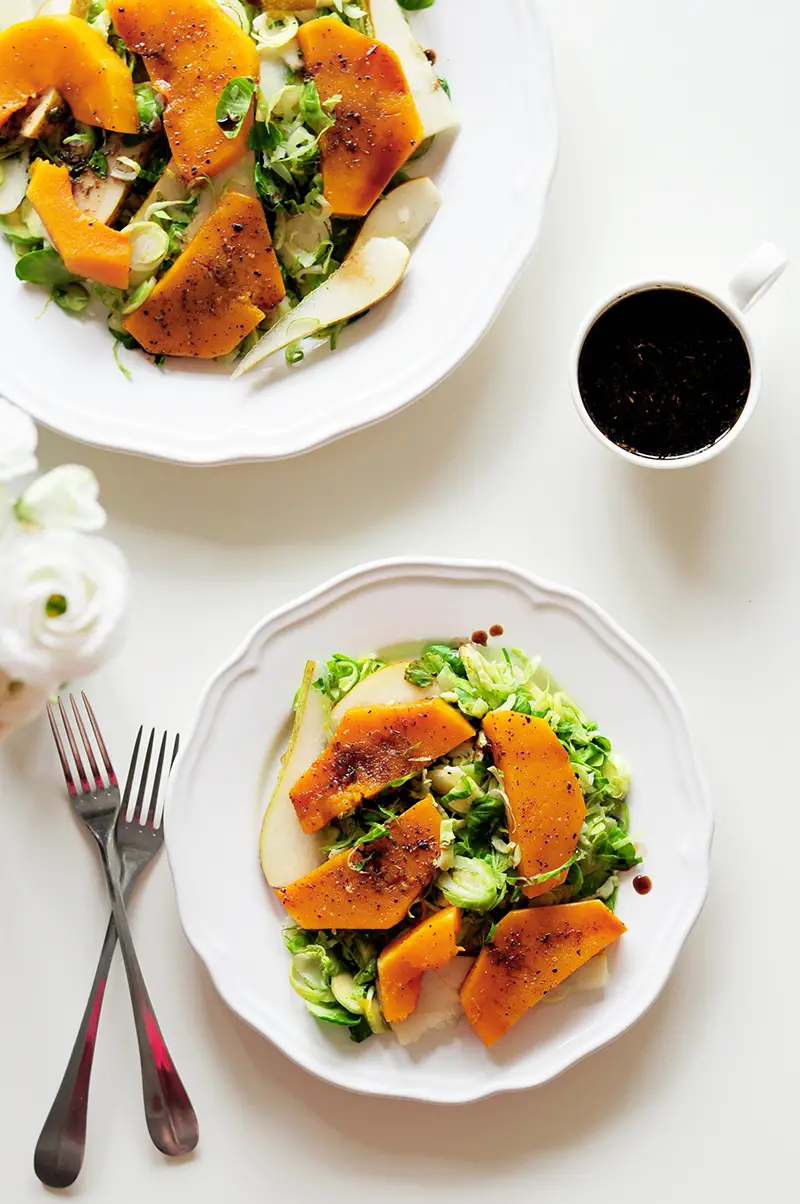 This sous vide butternut squash salad comes with an extra punch of flavor from pears, Brussels sprouts and a homemade balsamic vinegar glaze.
