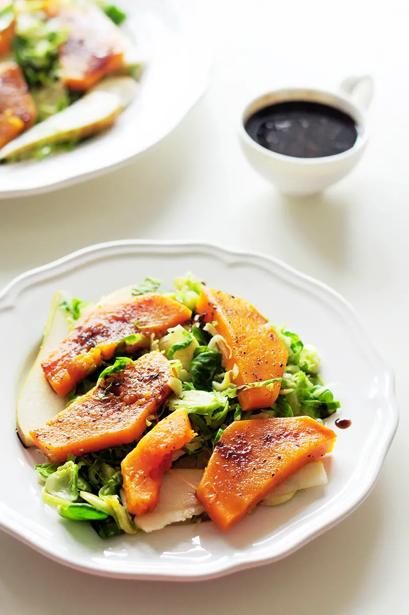 This sous vide butternut squash salad comes with an extra punch of flavor from pears, Brussels sprouts and a homemade balsamic vinegar glaze.