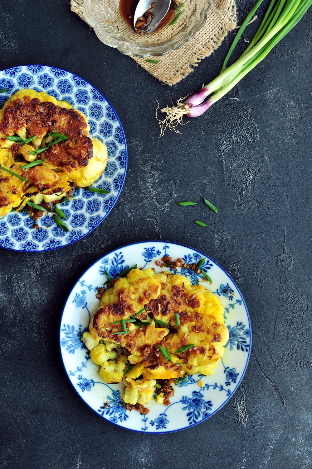 Experience spiced sous vide cauliflower steak with a soy-ginger sauce made gluten-free for some serious umami goodness!