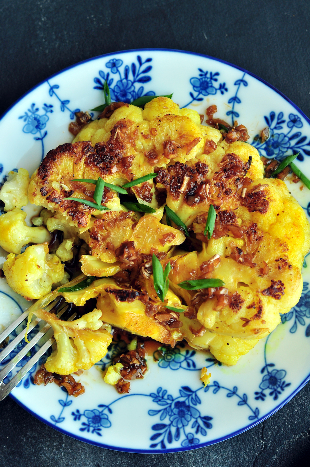 Experience spiced sous vide cauliflower steak with a soy-ginger sauce made gluten-free for some serious umami goodness!