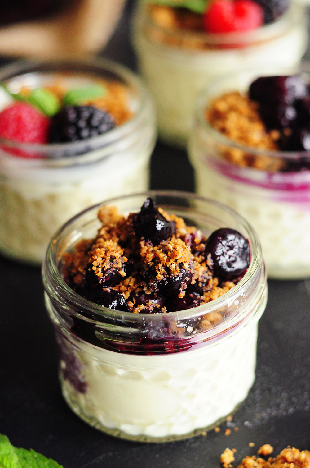 Sous Vide Cheesecake in a jar with blueberry toppings