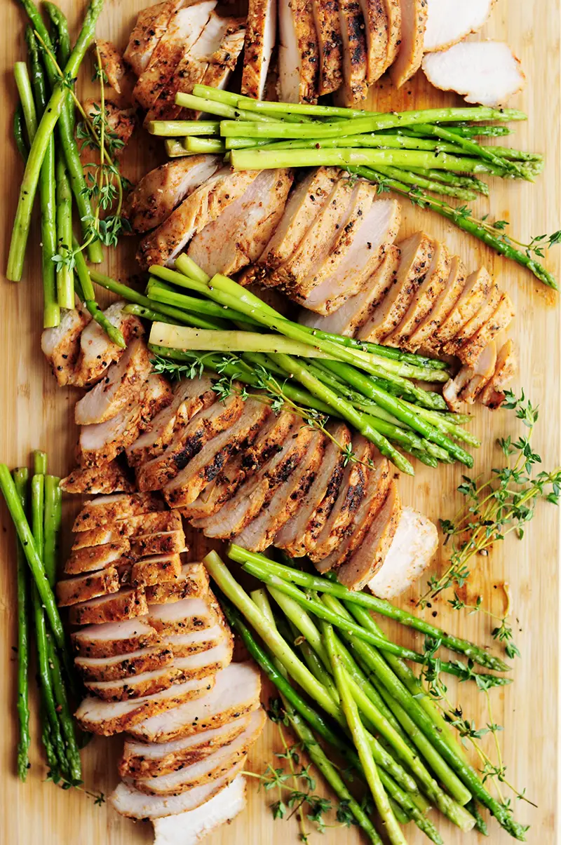 Perfectly tender and juicy sous vide chicken breast paired with sous vide asparagus makes a fabulous low-carb and gluten-free meal.