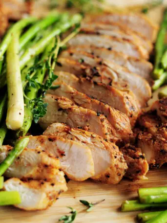 Perfectly tender and juicy sous vide chicken breast paired with sous vide asparagus makes a fabulous low-carb and gluten-free meal.