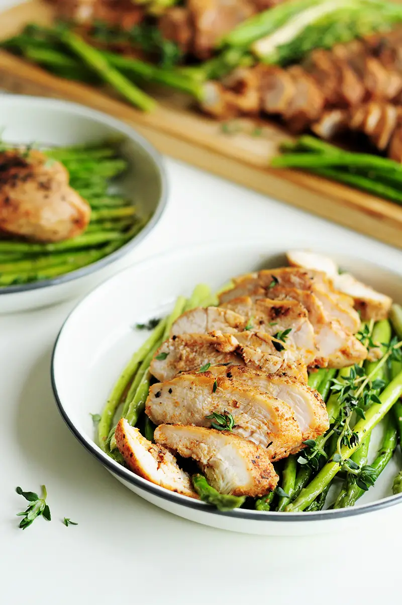 Perfectly tender and juicy sous vide chicken breast paired with sous vide asparagus makes a fabulous low-carb and gluten-free meal.