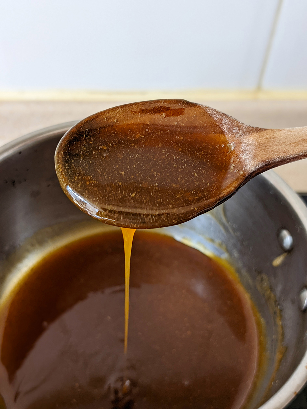 Pour the cooking juice from the steak bag into a small saucepan. Bring to a boil (this will allow the solids to form), then strain. Discard the solids and return the cooking juice into the saucepan and simmer until the sauce is thickened. Optionally, if you’d like a thicker sauce, dissolve one teaspoon of cornstarch in one tablespoon of cold water and add it to the sauce. Stir immediately. It will thicken right away. Remove from heat. 