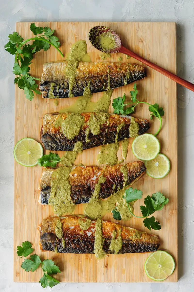 30-minute sous vide mackerel recipe with perfectly tender meat and crispy skin. Drizzled with a homemade spicy cilantro lime dressing, it makes a quick and easy workday dinner.