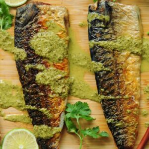 30-minute sous vide mackerel recipe with perfectly tender meat and crispy skin. Drizzled with a homemade spicy cilantro lime dressing, it makes a quick and easy workday dinner.