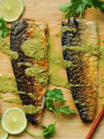 30-minute sous vide mackerel recipe with perfectly tender meat and crispy skin. Drizzled with a homemade spicy cilantro lime dressing, it makes a quick and easy workday dinner.