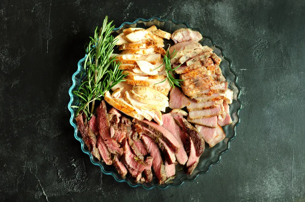 Sous vide chicken, pork chops, and steak 