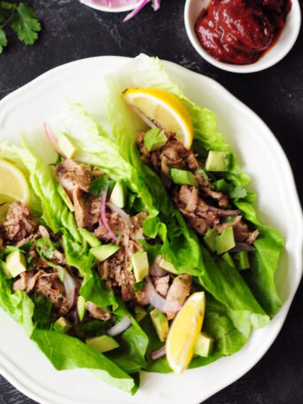 Loaded with Mexican flavor and only 15 minutes of prep, this sous vide pulled pork folded in fresh lettuce leaves is the perfect way to keep weekday low-carb meals exciting.