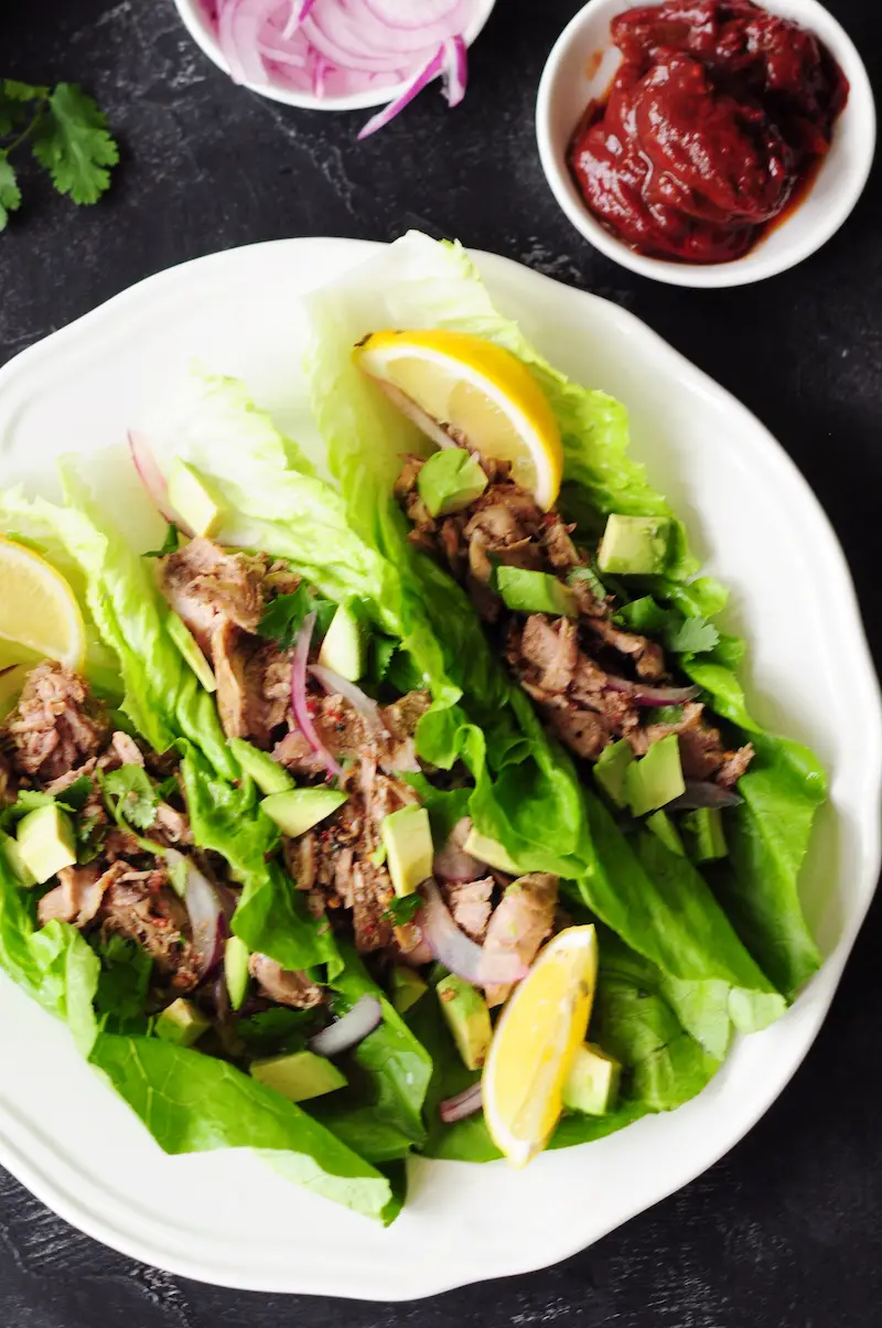 Loaded with Mexican flavor and only 15 minutes of prep, this sous vide pulled pork folded in fresh lettuce leaves is the perfect way to keep weekday low-carb meals exciting.