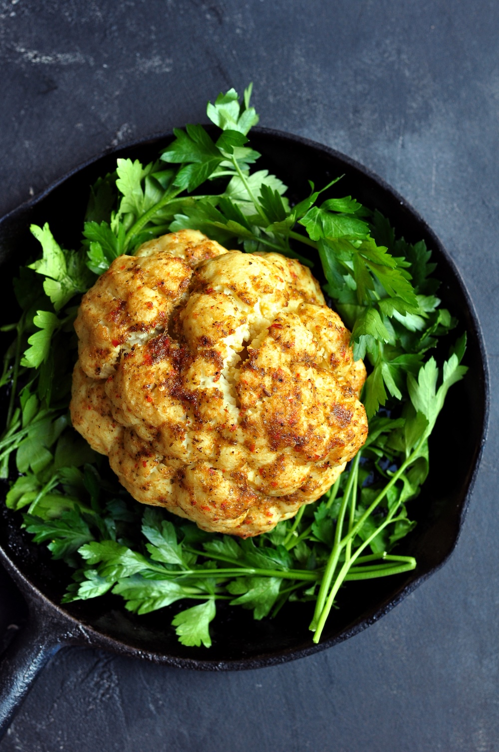 Sous vide whole cauliflower gets a bold jerk makeover! Perfectly tender inside, charred outside—plus brain-boosting benefits.