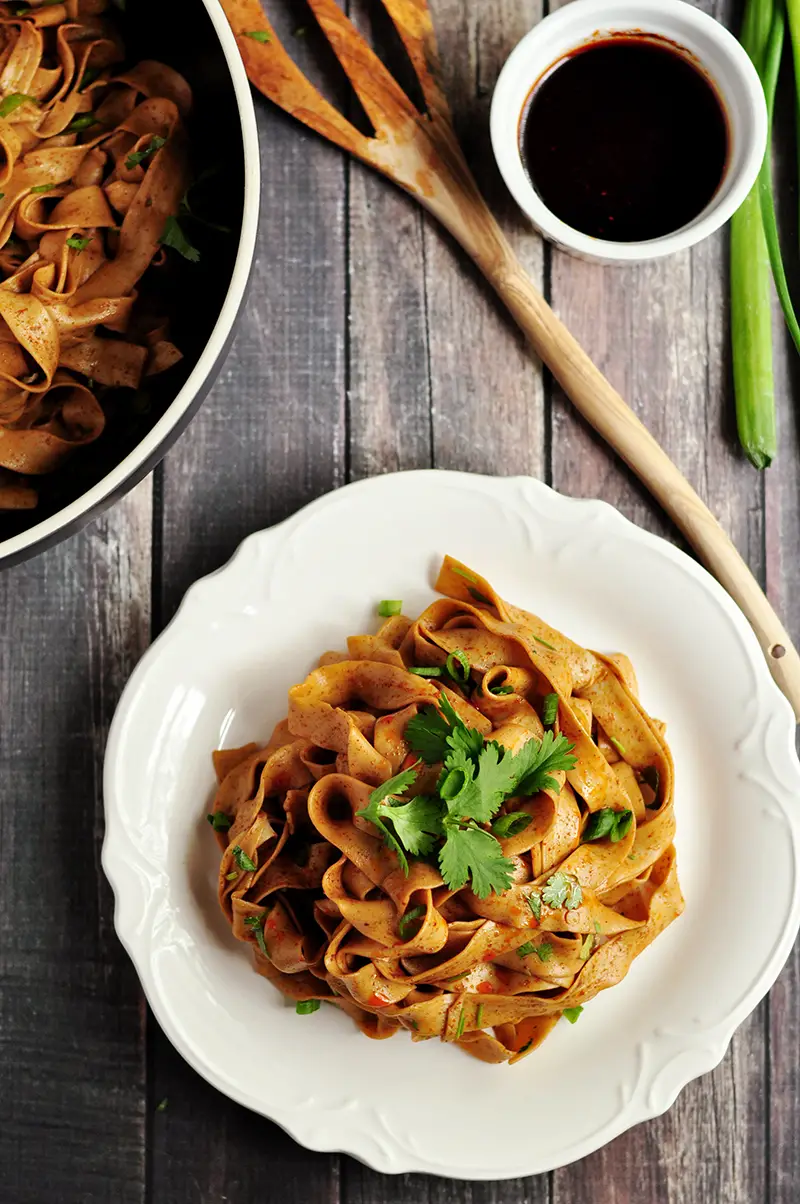 What’s savory, spicy, and requires only six ingredients? These spicy Chinese noodles made with hot chili oil for authentic flavor. Gluten-free option included. 