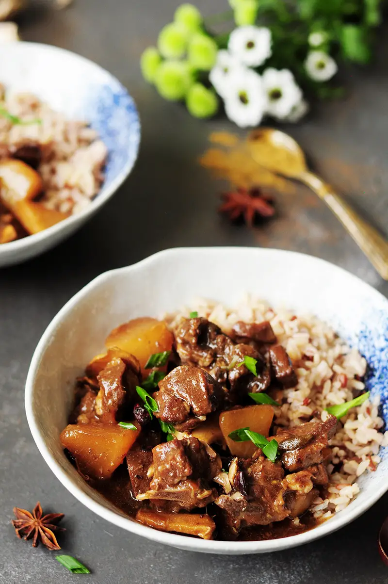 Winter comfort food done right: This spicy, Asian-inspired lamb stew is flavored with Asian sauces, Thai chilis, star anise to warm you up from the inside.