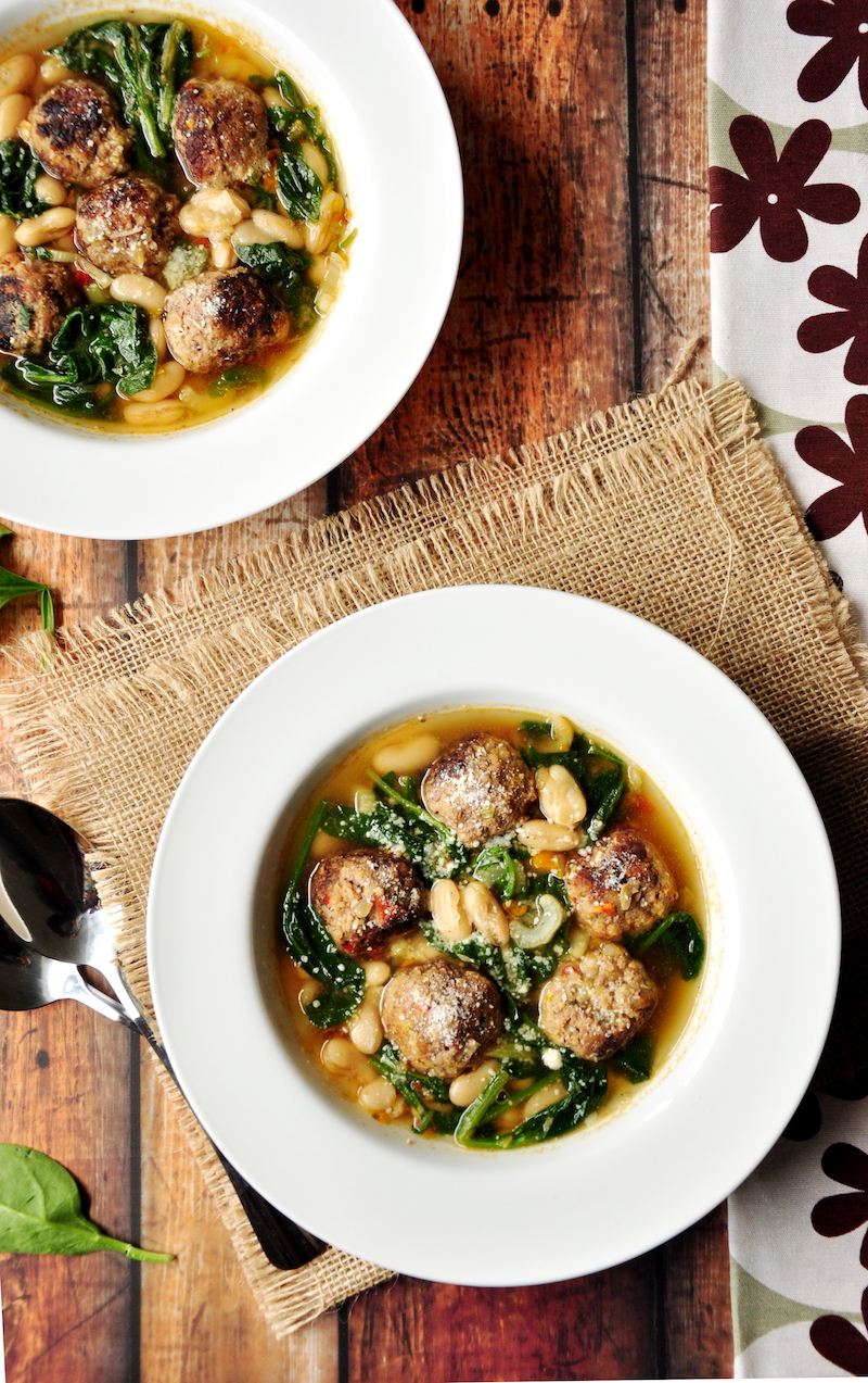 A simple twist on a classic Italian meatball soup: this hearty soup recipe features easy-to-make meatballs, vegetables, cannelloni beans, and spinach, simmered in a collagen-rich beef bone broth.