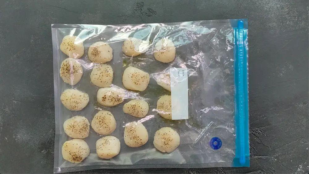 arrange scallops in a single layer in a sous vide bag