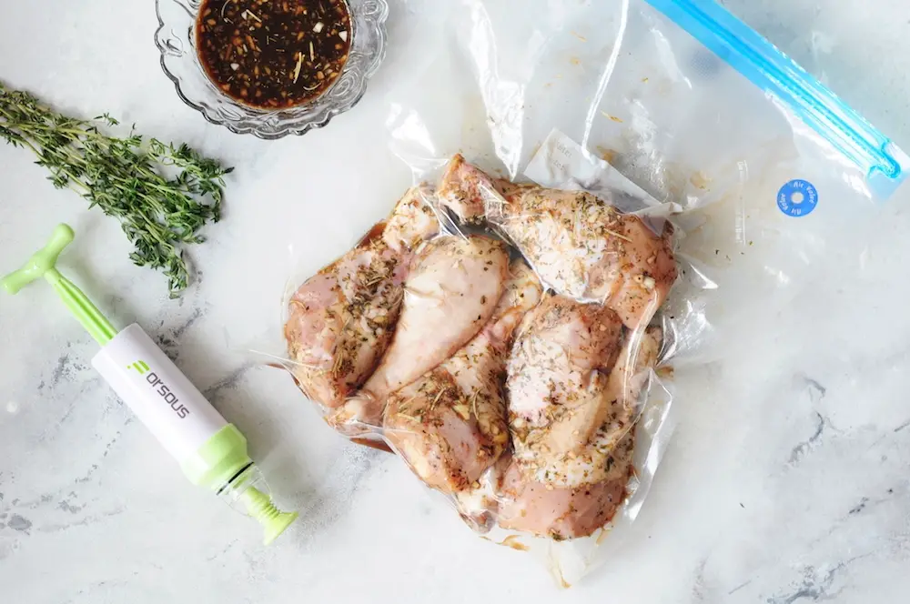 Vacuum sealed chicken drumsticks with a hand pump