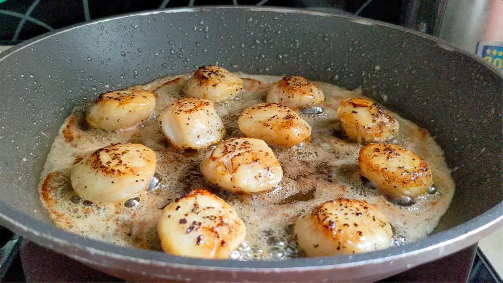 sear sous vide scallops in a hot pan
