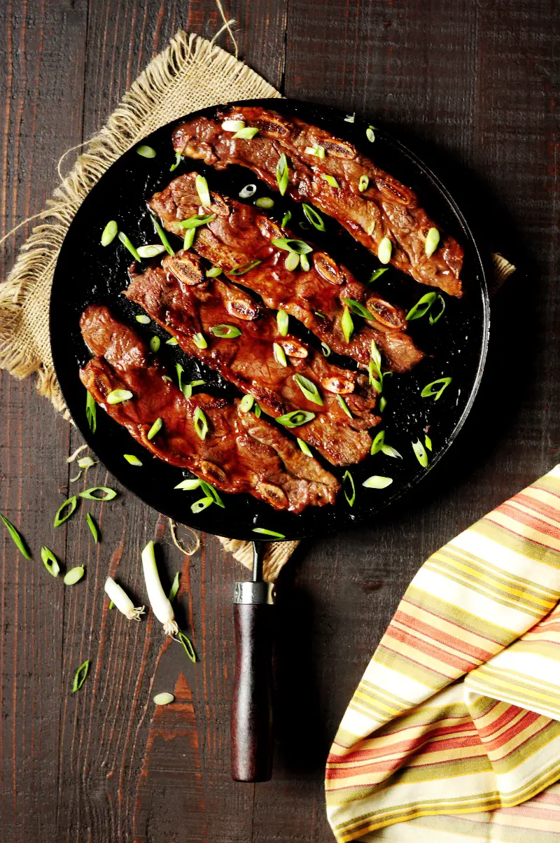 Quick and easy Asian ribs with only 3 ingredients pan grilled on the stove top. This is a great meat option for a busy workday dinner. 