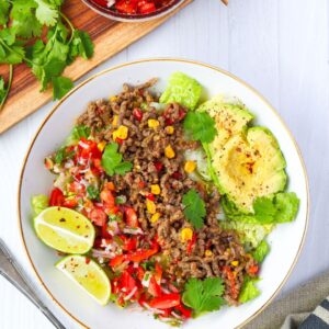 This ground beef taco salad bowl with refreshing pico de gallo is a 30-minute, high-protein meal packed with flavor. It's great for busy weeknights.