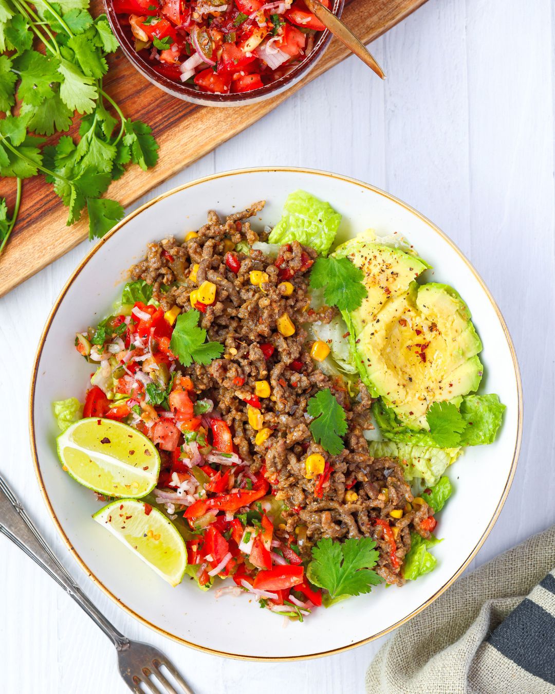 This ground beef taco salad bowl with refreshing pico de gallo is a 30-minute, high-protein meal packed with flavor. It's great for busy weeknights.