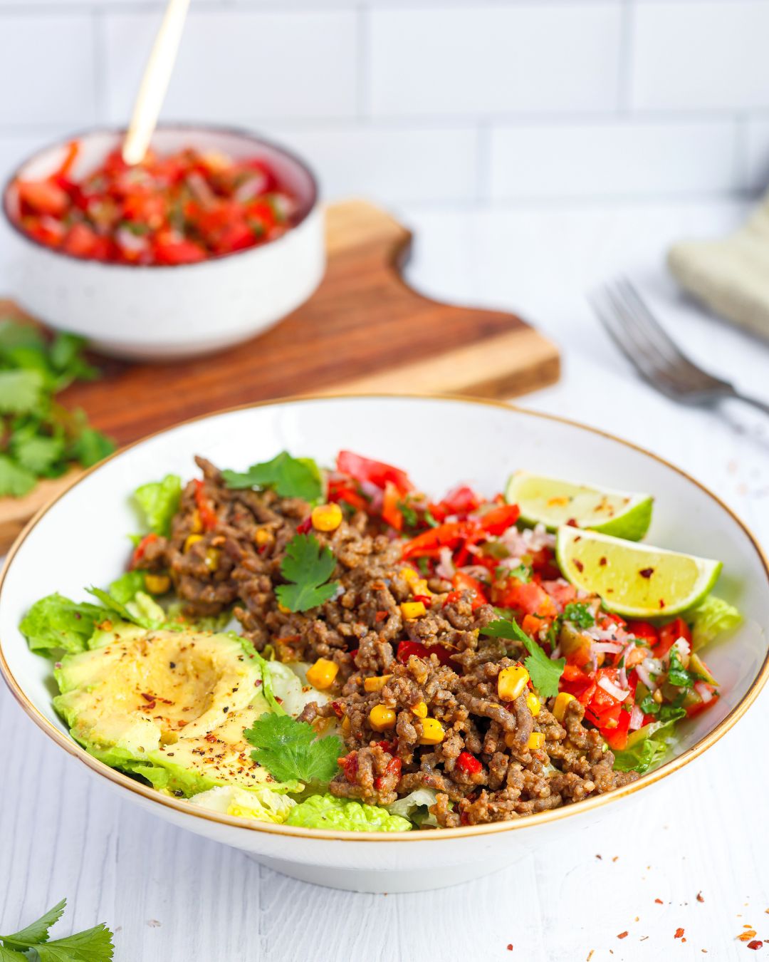 This ground beef taco salad bowl with refreshing pico de gallo is a 30-minute, high-protein meal packed with flavor. It's great for busy weeknights.