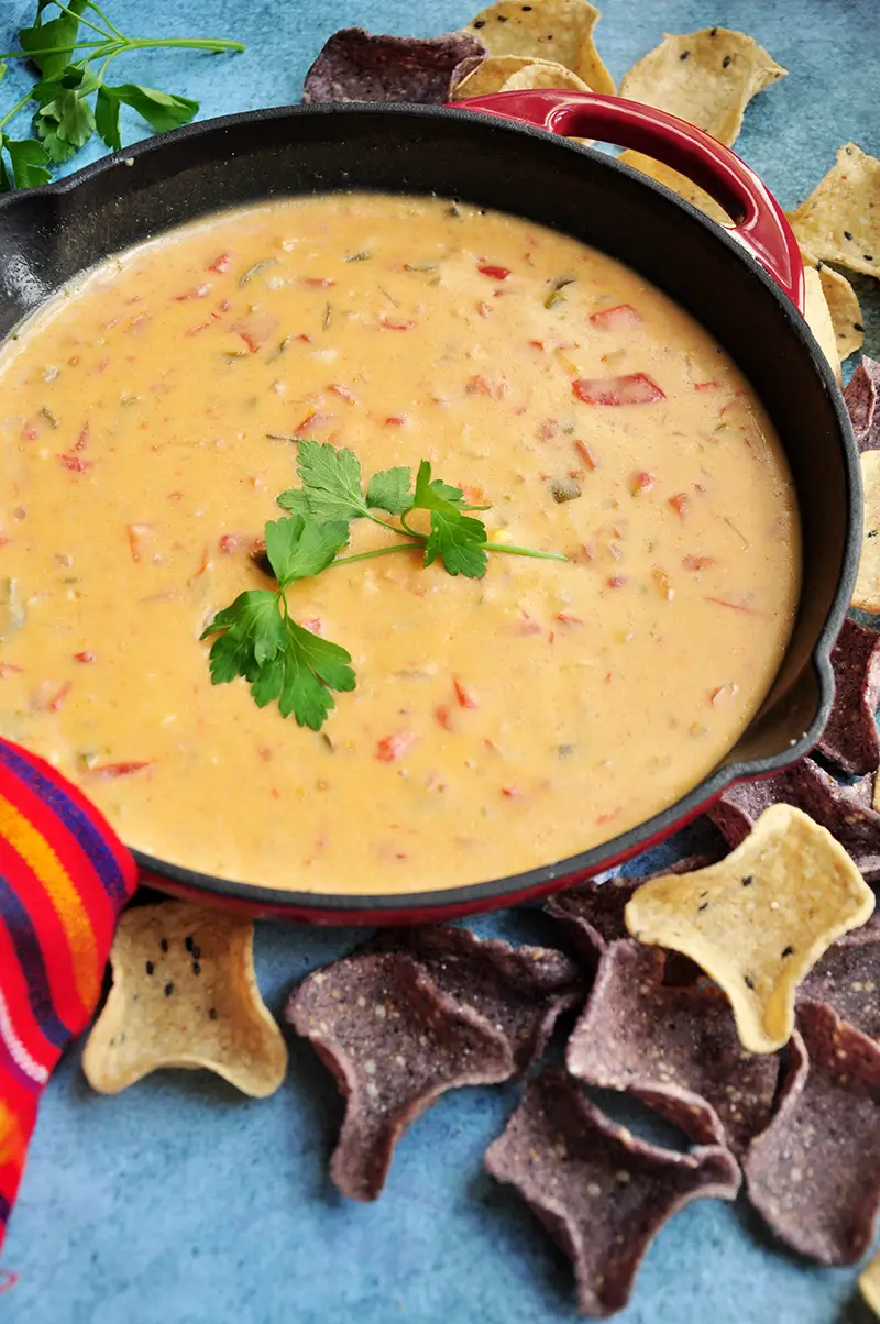 Ten ingredients and 20 minutes are all you need for this velvety, rich, and dangerously addictive Tex-Mex Chili Con Queso recipe. It’s also gluten-free.