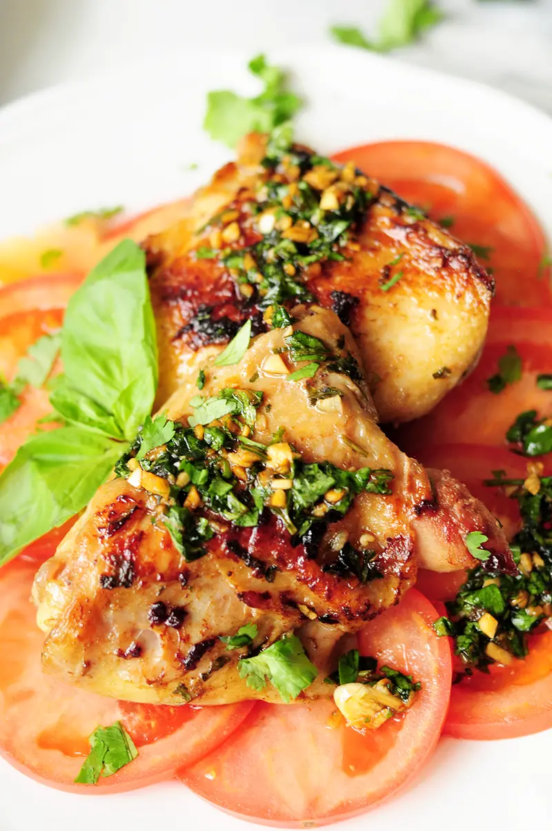 Thai night can be healthy, low carb and delicious with these Thai sous vide chicken thighs served over a bed of tasty tomato salad.