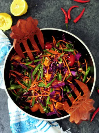 This simple Thai vegetable salad features an authentic Thai flavor with a gentle kick. It’s also gluten-free and vegan.