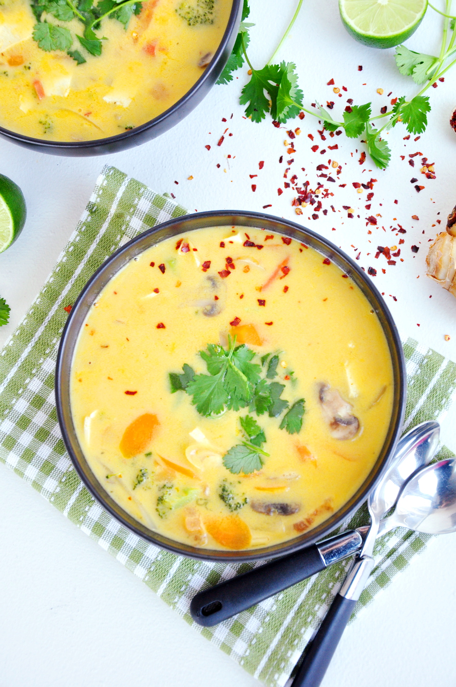 A light Thai vegetable soup recipe, flavored with authentic herbs along with hearty vegetables, coconut milk, and tofu. It's vegan and gluten-free friendly.