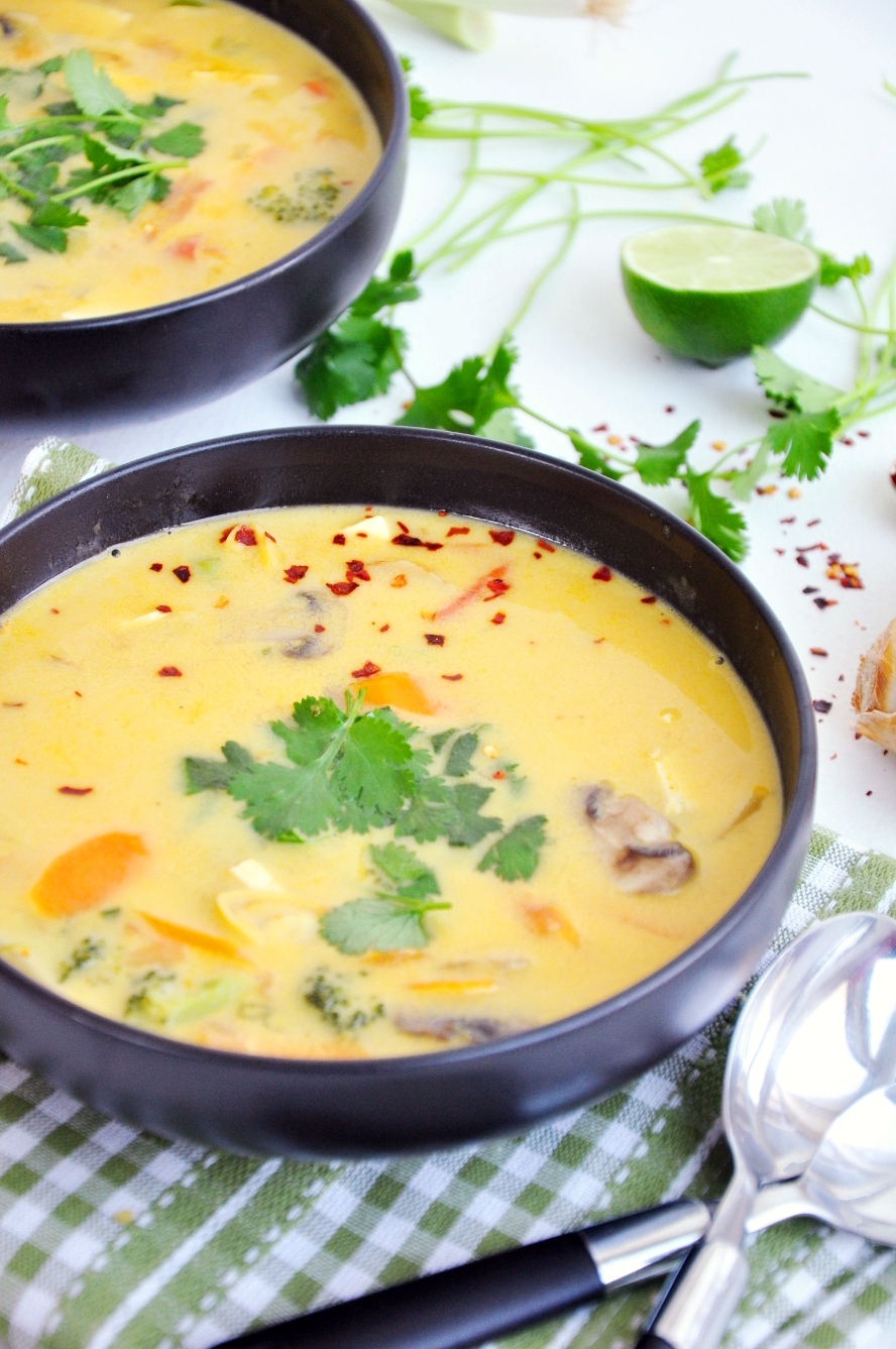 A light Thai vegetable soup recipe, flavored with authentic herbs along with hearty vegetables, coconut milk, and tofu. It's vegan and gluten-free friendly.