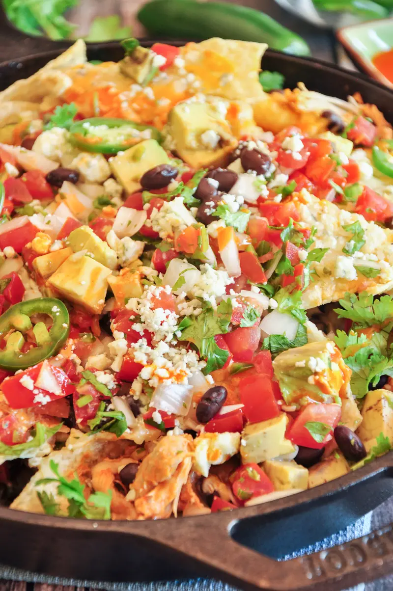 The best gooey, tangy, spicy buffalo chicken nachos you’ve ever had. Loaded with three types of cheese and fresh, Mexican-style ingredients. Ready in 20 minutes.