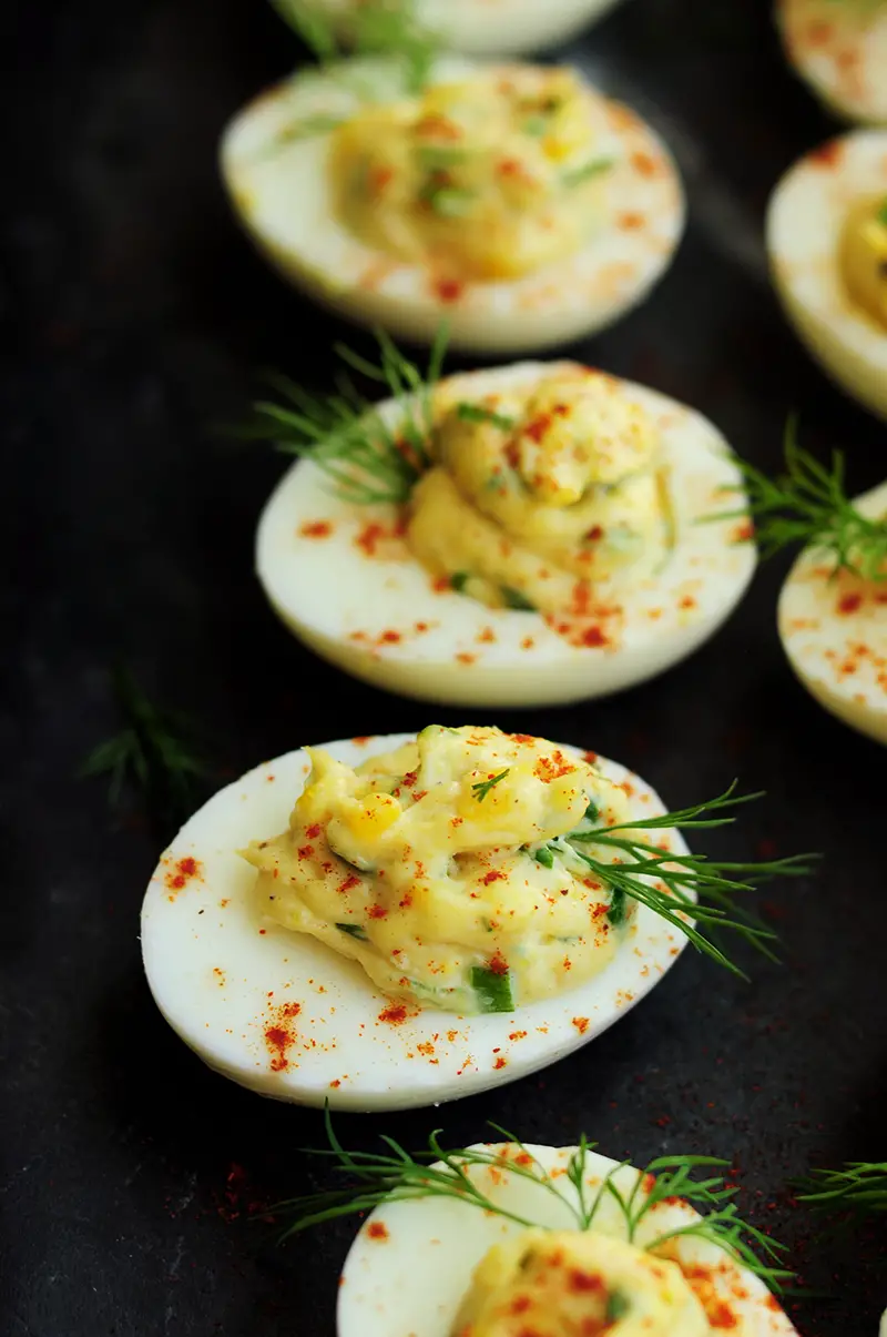 This tuna deviled eggs recipe combines tuna with mayonnaise, Dijon mustard, horseradish, green onion, eggs, and dill to make a deliciously fun appetizer!