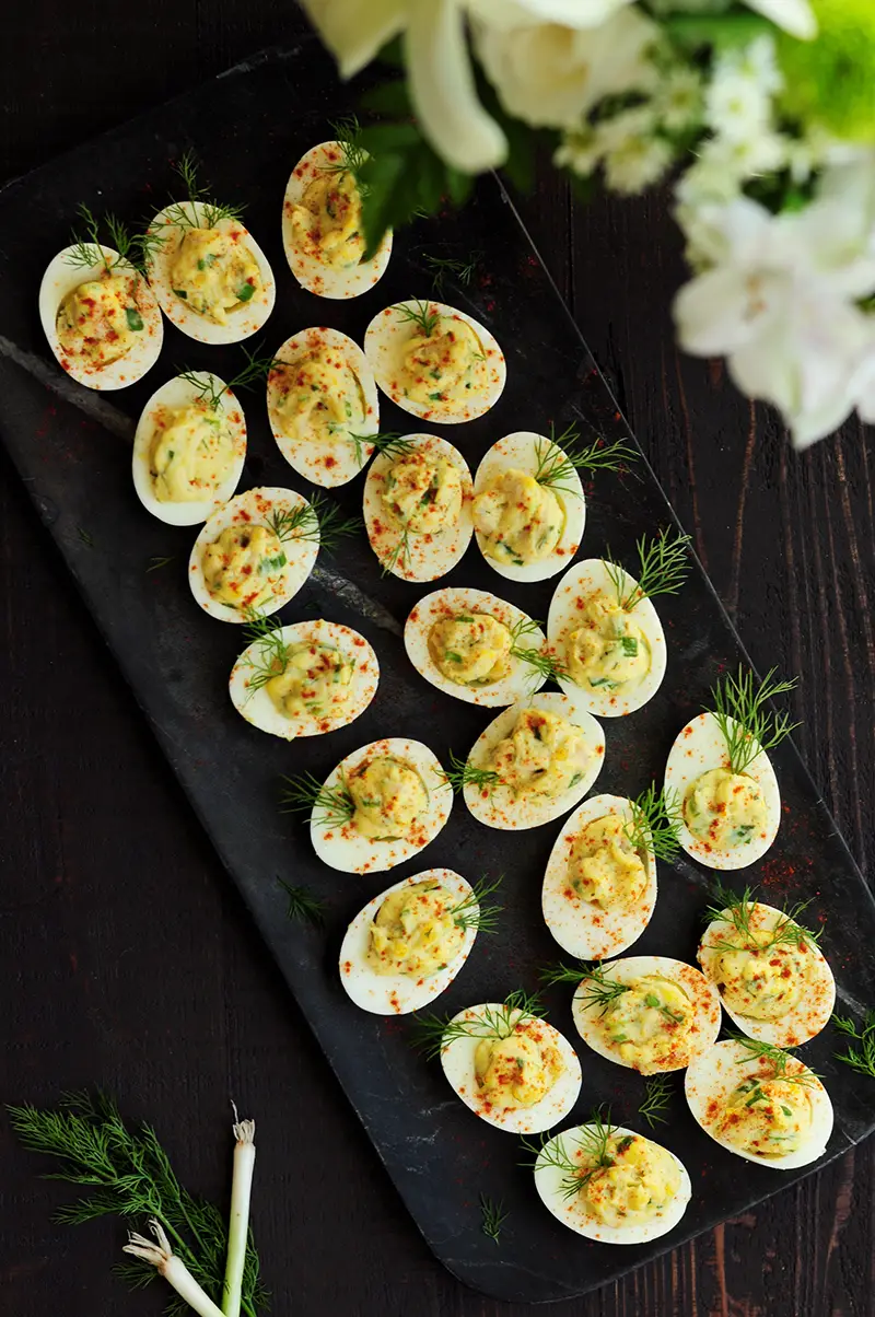 This tuna deviled eggs recipe combines tuna with mayonnaise, Dijon mustard, horseradish, green onion, eggs, and dill to make a deliciously fun appetizer!